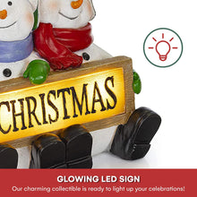 Load image into Gallery viewer, VP Home Glowing Merry Christmas Sign Trio LED Snowman Decor Christmas Figurines Resin Lighted Snowman Decorations Holiday Light up Snowman Indoor Festive Fiber Optic Decorations