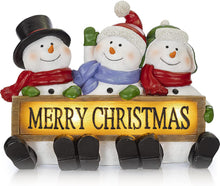 Load image into Gallery viewer, VP Home Glowing Merry Christmas Sign Trio LED Snowman Decor Christmas Figurines Resin Lighted Snowman Decorations Holiday Light up Snowman Indoor Festive Fiber Optic Decorations